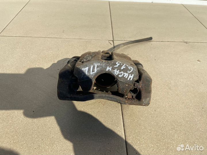 Тормозной суппорт перед лев Nissan Almera G15