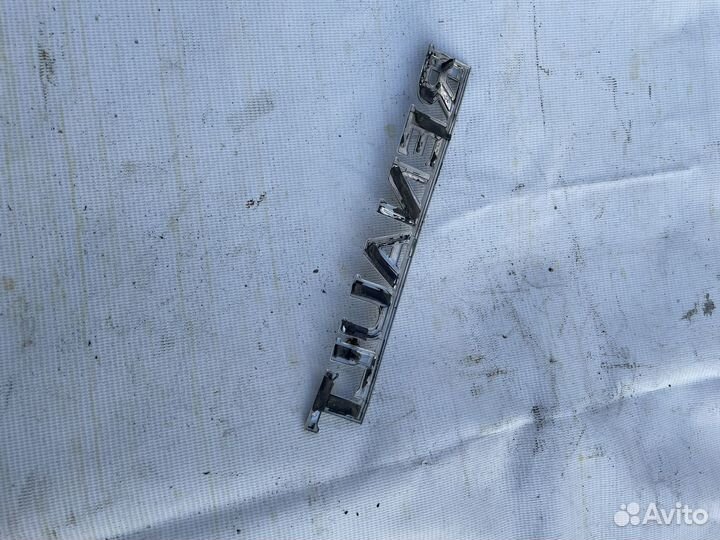 Шильдик renault logan