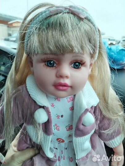 Кукла мягконабивная,говорящая