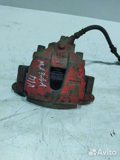 Суппорта передние Mazda 3 2004