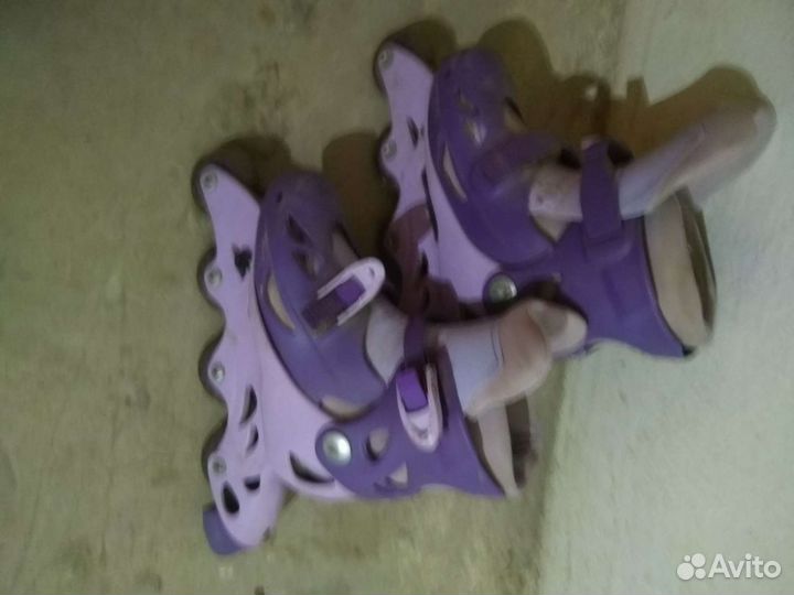 Роликовые коньки