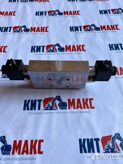 Гидрозамок (101001191Гидрозамок переднего отвала)