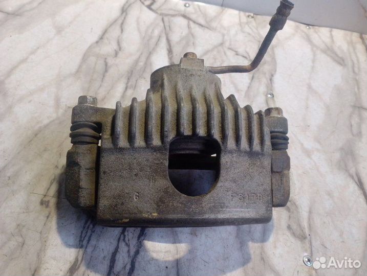 Суппорт тормозной передний правый Kia Sportage FE