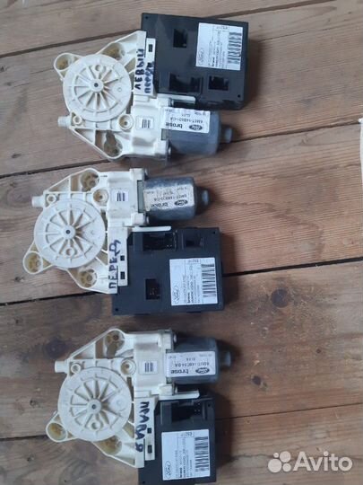 Моторчик стеклоподъемника Ford Focus 2