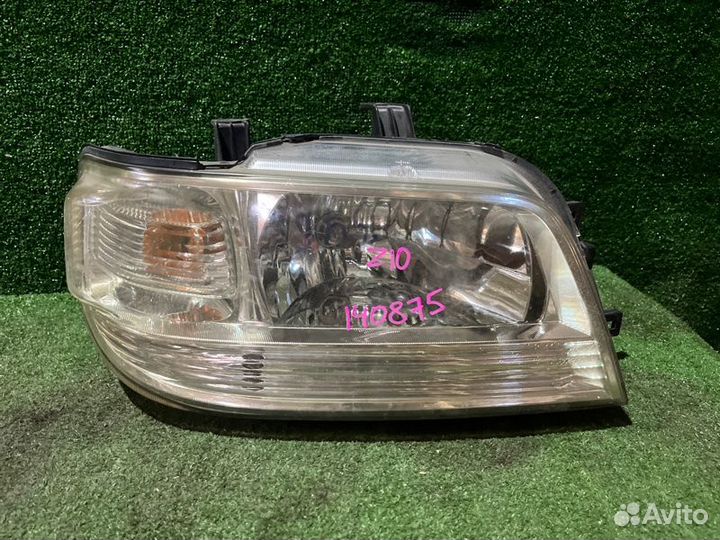 Фара передняя правая Nissan Cube Z10