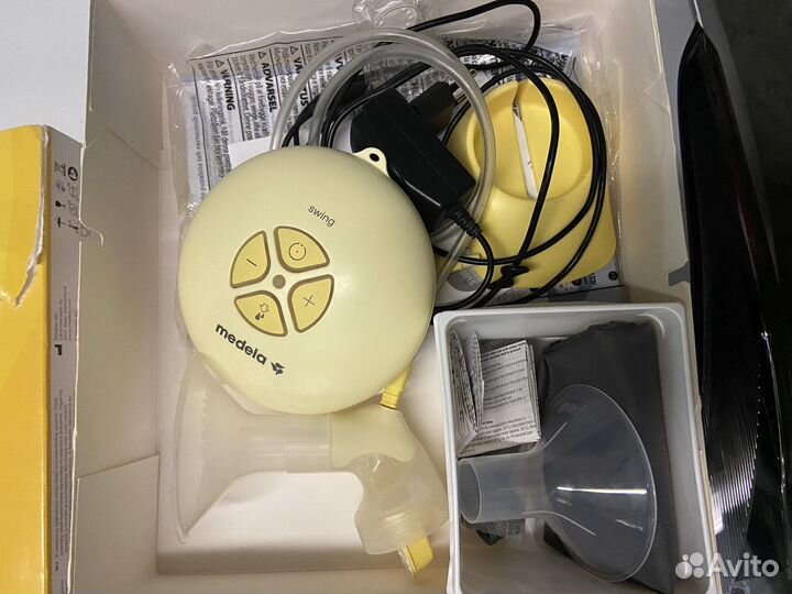 Молокоотсос medela электрический