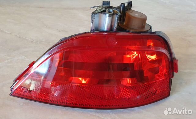 Оригинал фонарь противотуманный левый