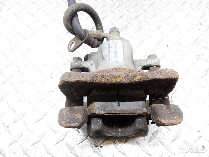 Суппорт задний правый Toyota Camry 6 XV40