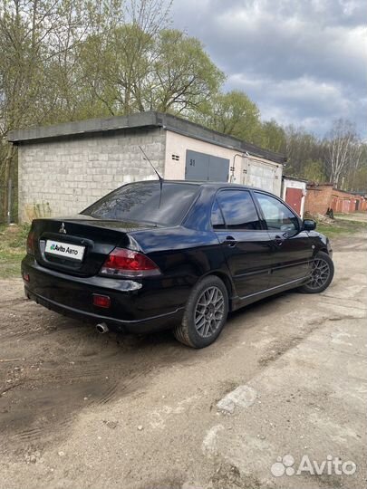 Mitsubishi Lancer 1.6 AT, 2009, 320 000 км