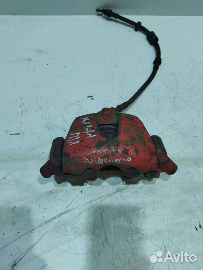 Суппорта передние Mazda 3 2004