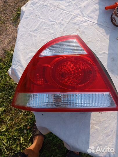 Фары задние Nissan Almera Classic B10