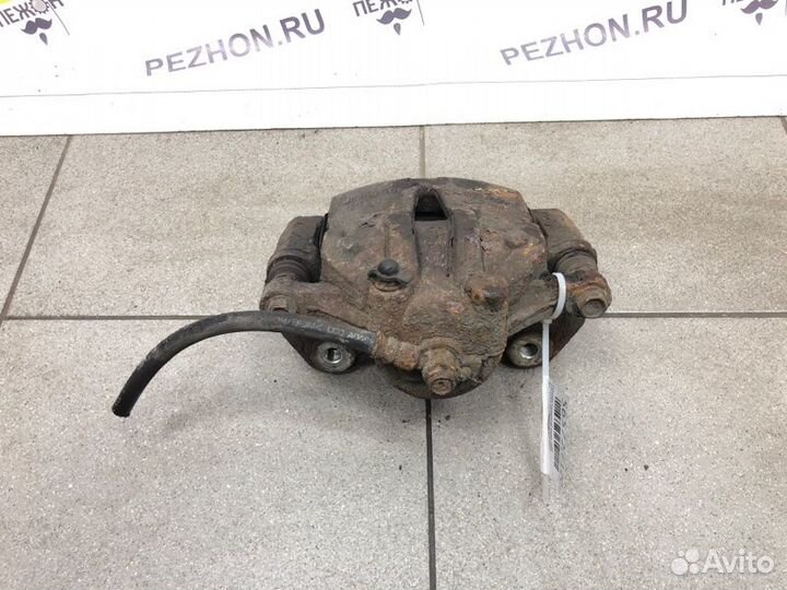 Суппорт тормозной передний правый Kia Ceed хэтчбек