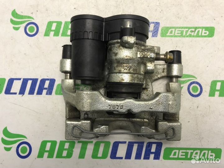 Суппорт тормозной задний правый Mazda 3 BP PE / P5