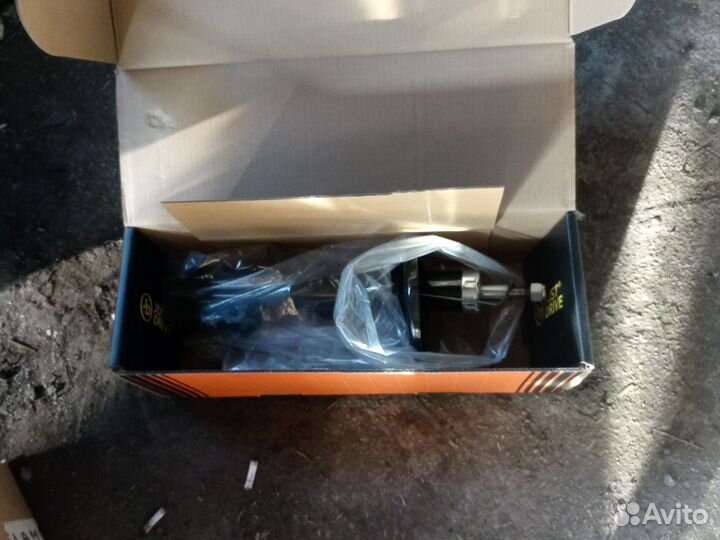 Стойка амортизатора задняя левая