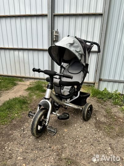 Детский трехколесный велосипед с ручкой