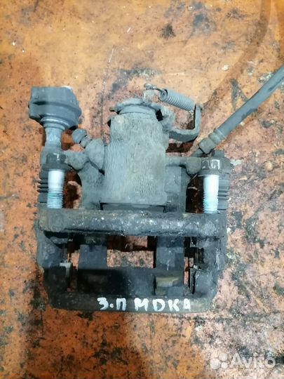 Суппорт тормозной задний правый Opel Mokka