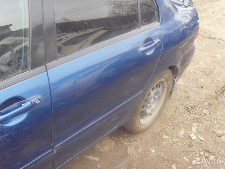 Дверь задняя левая 5730A191 Mitsubishi Lancer 9