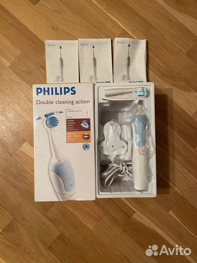 Электрическая зубная щетка philips новая