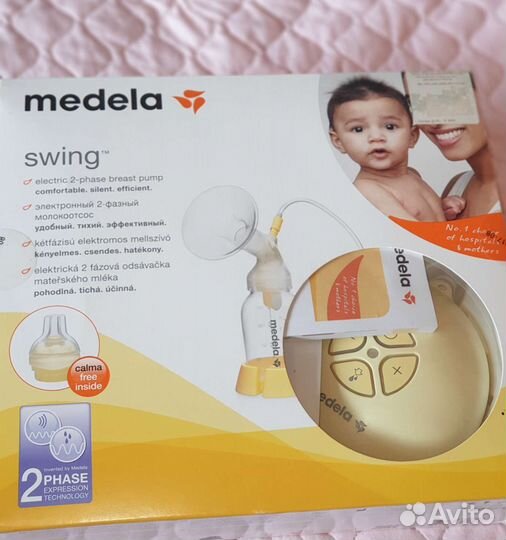 Молокоотсос medela swing электрический