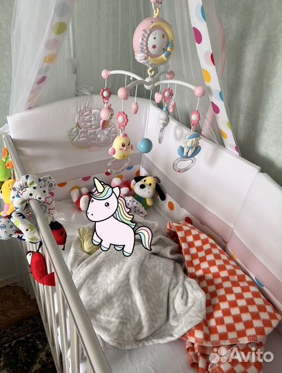 Музыкальный мобиль на кроватку розовый