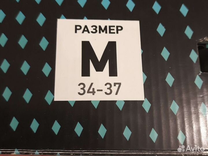 Роликовые коньки