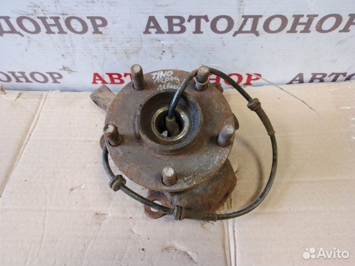 Поворотный кулак передний левый Nissan Almera Tino