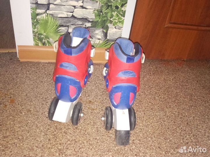 Роликовые коньки