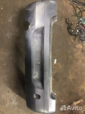 Задний бампер с дефектом на renault logan 1 2008г