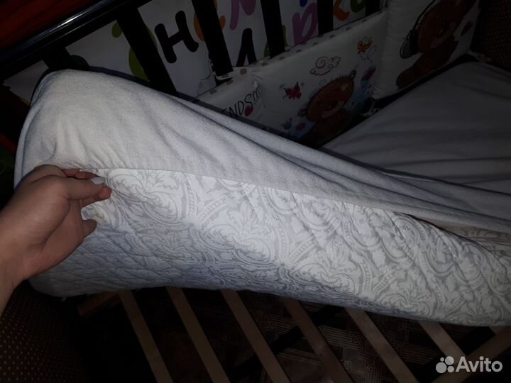 Детская кроватка с маятником