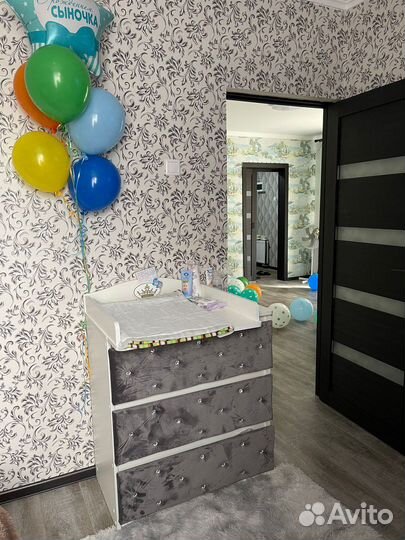 Детская кроватка с маятником