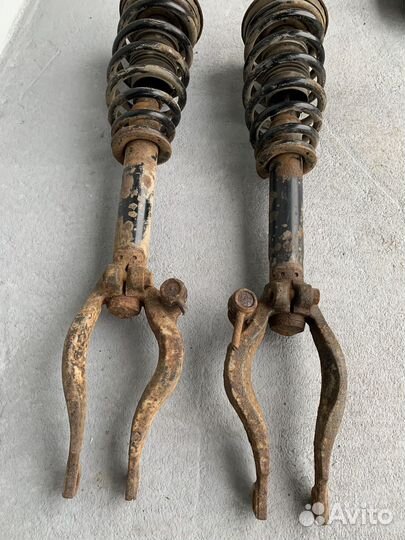 Стойка амортизатора передняя Mitsubishi Galant 7