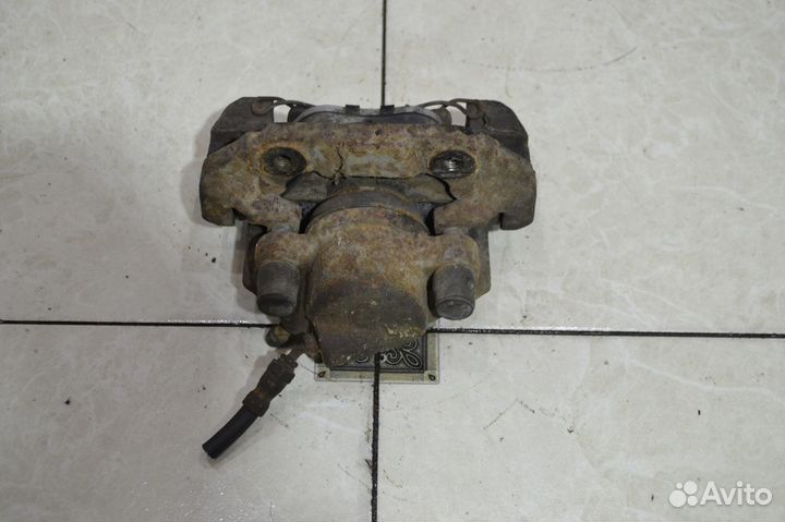 Тормозной суппорт передний правый Ford Fusion