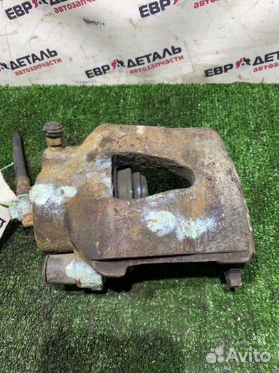 Суппорт тормозной передний левый Skoda Octavia A5