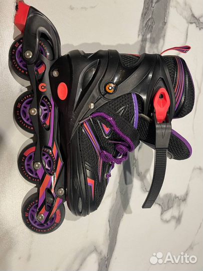 Роликовые коньки