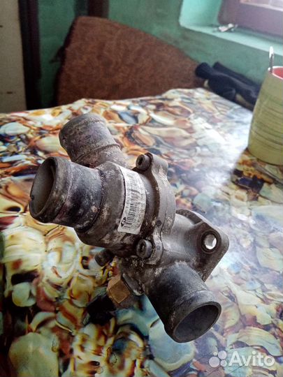 Термостат в сборе с корпусом ваз 2110-14. Калина