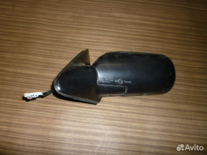 Зеркало левое Nissan Primera I P10
