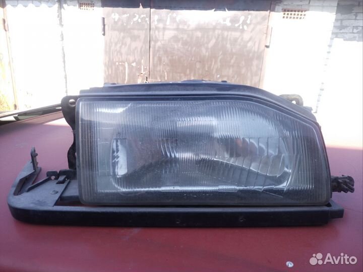 Фара Мазда 323 bf bw