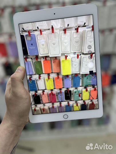 Планшет iPad Air 2 64 Gb Wi-Fi+Sim белый