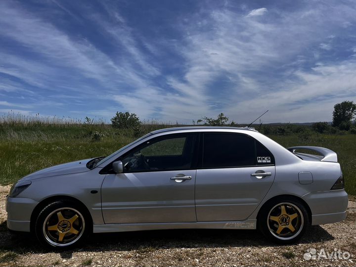 Mitsubishi Lancer 2.0 МТ, 2004, 233 000 км