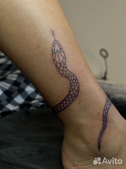 Мастер татуировки