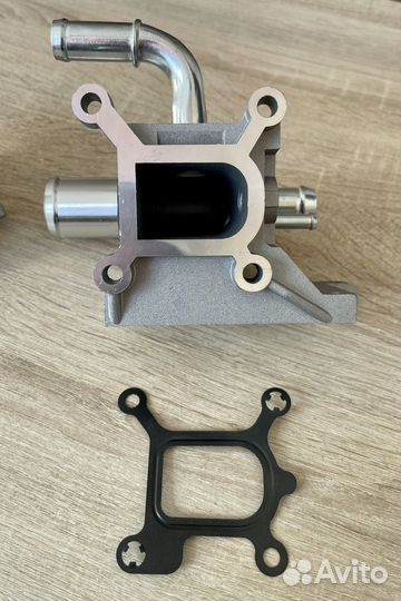 Фланец (тройник) системы охлаждения Mazda, Ford