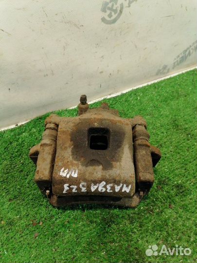 Суппорт тормозной передний правый Mazda 323 6 (BJ)