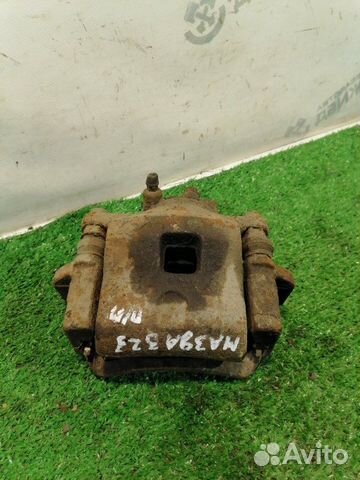 Суппорт тормозной передний правый Mazda 323 6 (BJ)