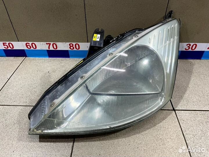 Фара левая Ford Focus I