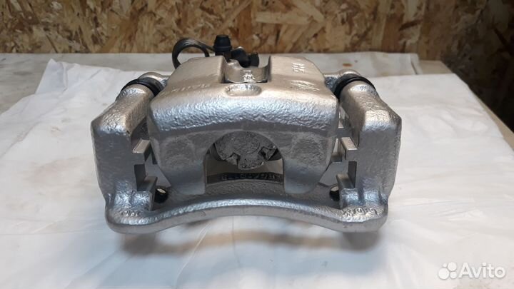 Суппорт задний левый Kia Rio 3