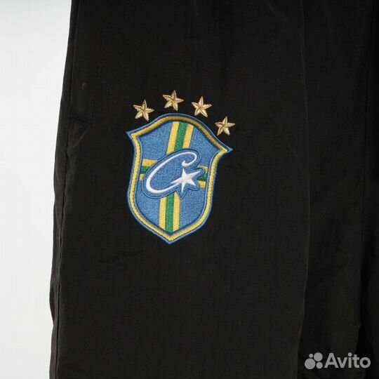 Штаны Corteiz на руках,на весну