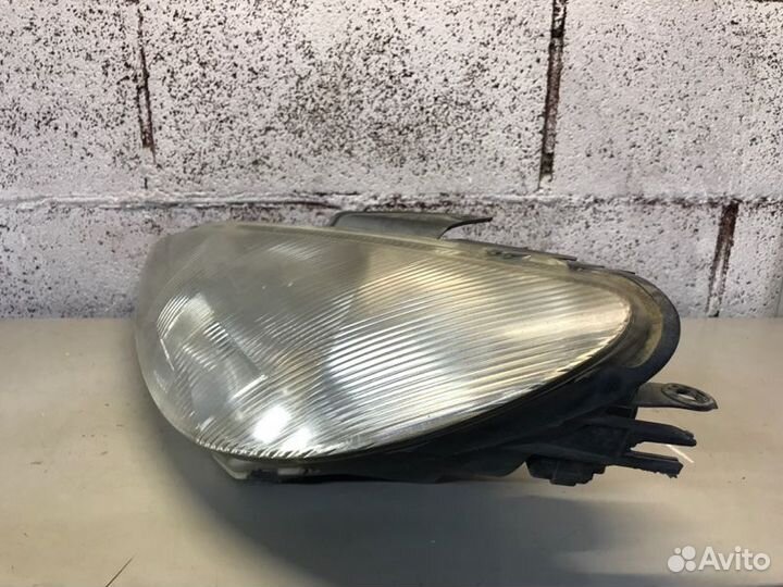 Фара передняя левая Peugeot 206 хетчбек 1.9D 1998