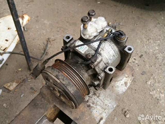 Компрессор кондиционера Mitsubishi Lancer 9