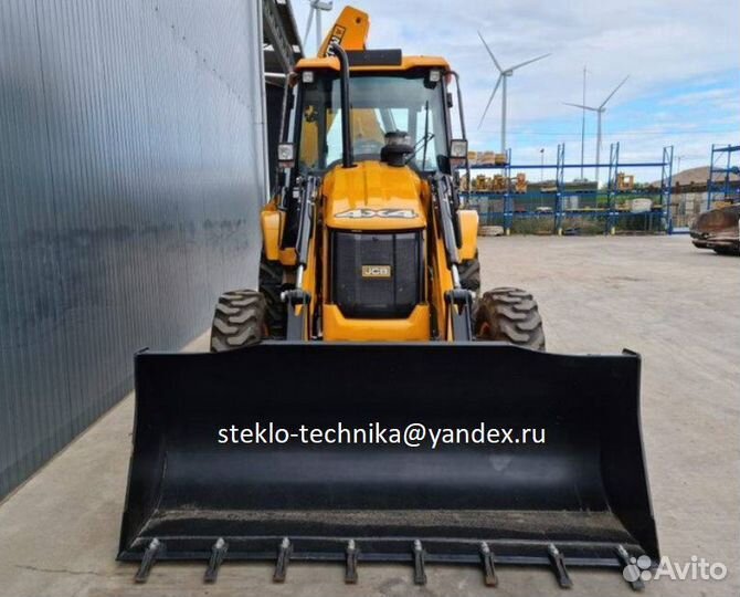 Стекло дверное нижнее на экскаватор погрузчик JCB