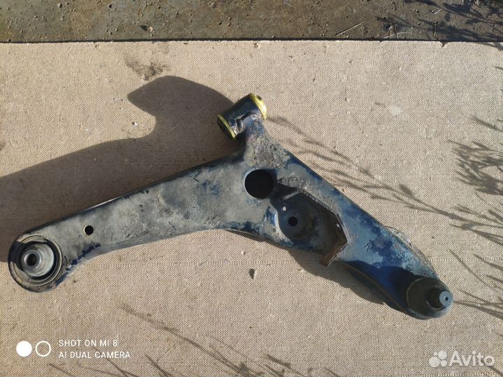 Нижний передний рычаг Митсубиси outlander 1